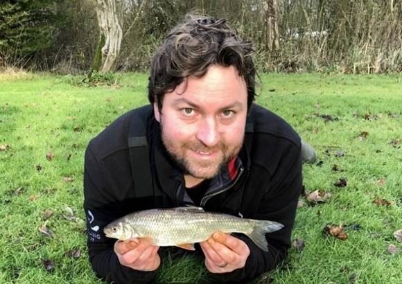 Jamie Cook, Angling Trust CEO with dace fish