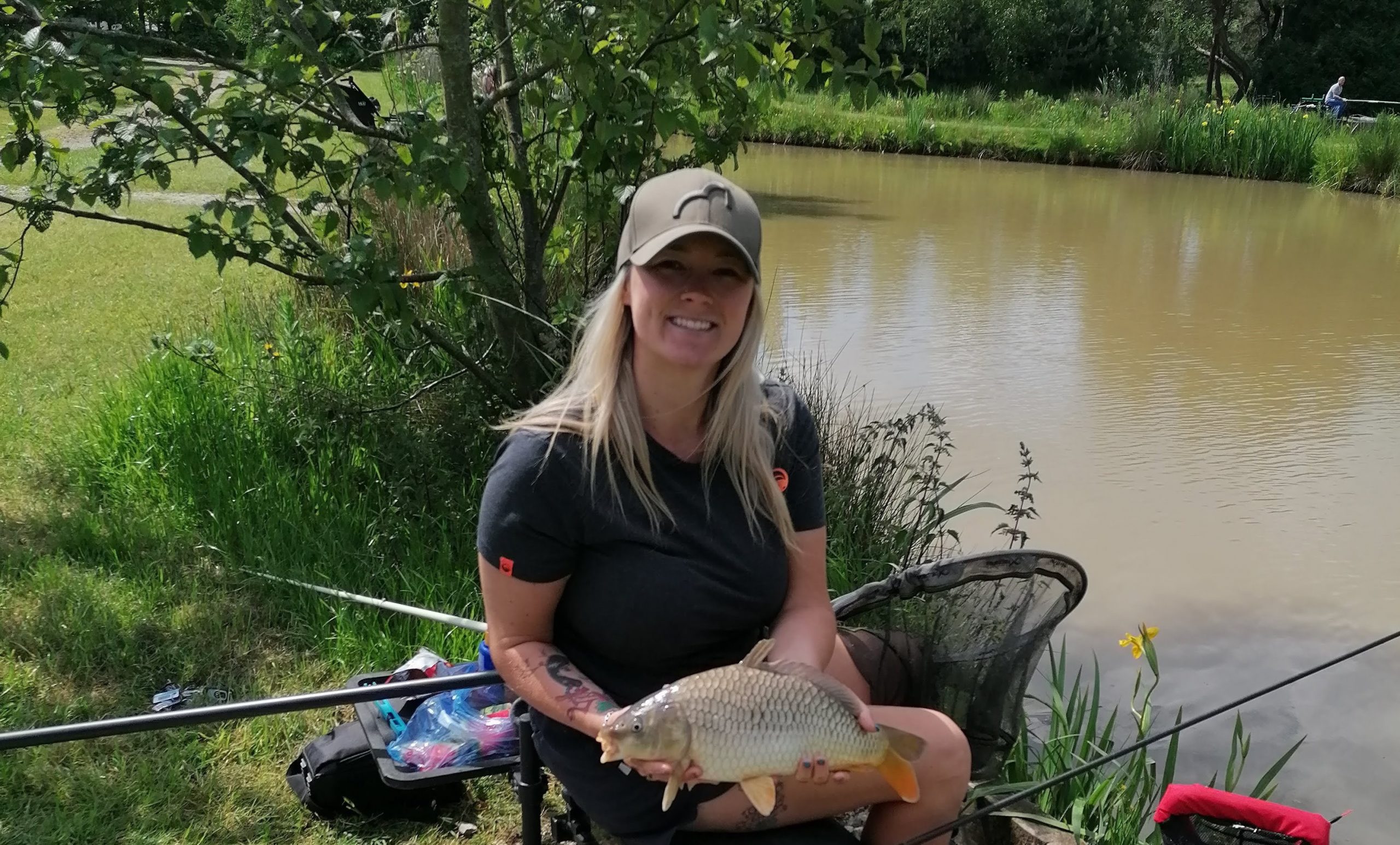 Get Fishing | Emma Harrison Fishing with a carp at a commercial fishery-crop header-2