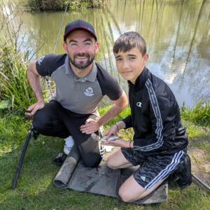 Get Fishing | Jack helping a newcomer to learn to fish-2